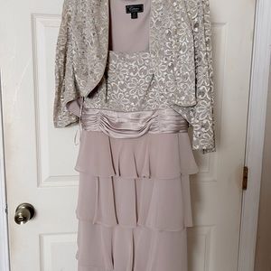 Mother of the Bride Dress. Taupe in color and hits just at the knees fits a sz16